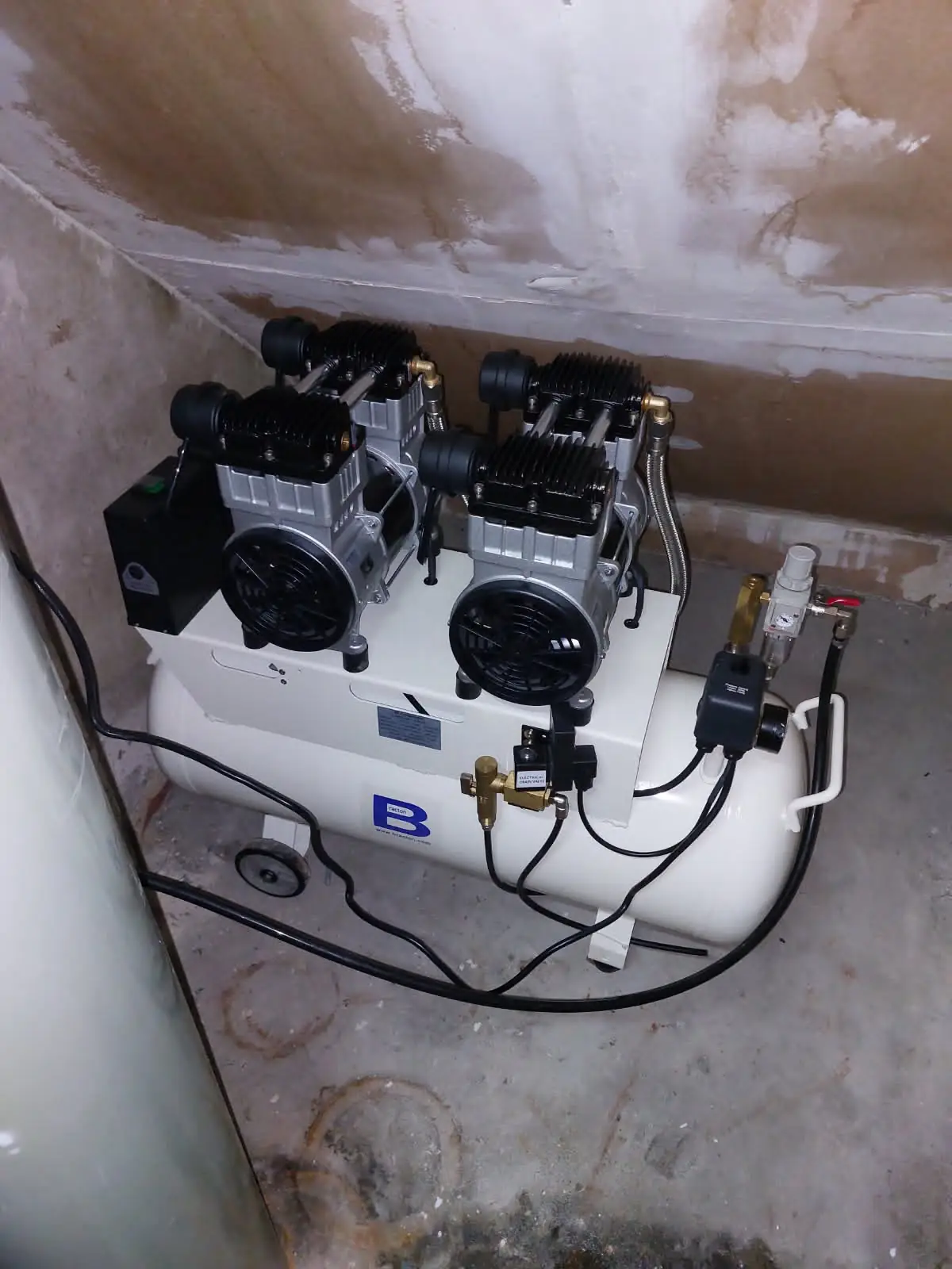 Air compressor installed for a commercial beer system
